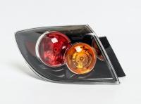 Ліхтар Mazda 3 хетчбек задній лівий зовнішній прозорий 2004-2007